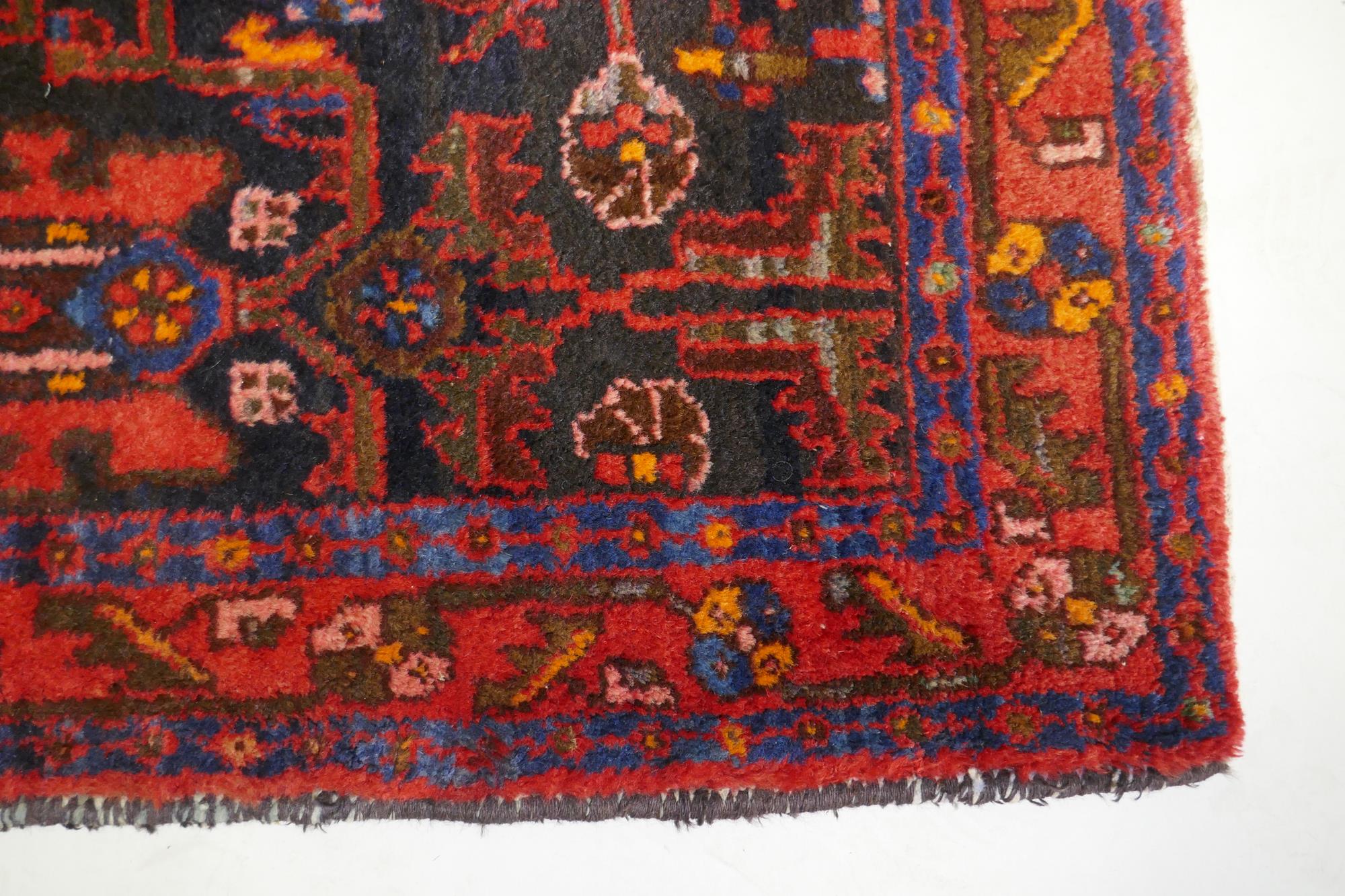 A Persian Hamadan red ground wool rug with unique geometric design, 148 x 104cm - Image 2 of 3
