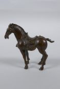 A Chinese bronze figure of a Tang style horse, 7cm high
