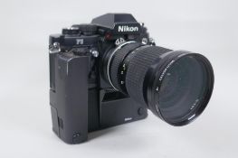 A Nikon F3 SLR camera, Serial No 1265547, fitted with a Zoom Nikkor 25-50mm F:4 lens and a Nikon