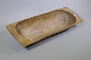 A large antique rustic pine dough trough, 111 x 40cm