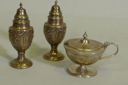 A pair of silver pepper pots, Sheffield 1901, Thomas Bradbury & Sons Ltd, and a mustard pot,