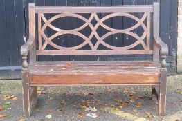 A hardwood garden bench, 123cm wide