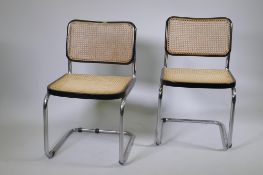 A pair of Italian mid century Marcel Breuer B32 Cesca dining chairs, with tubular chrome frames,