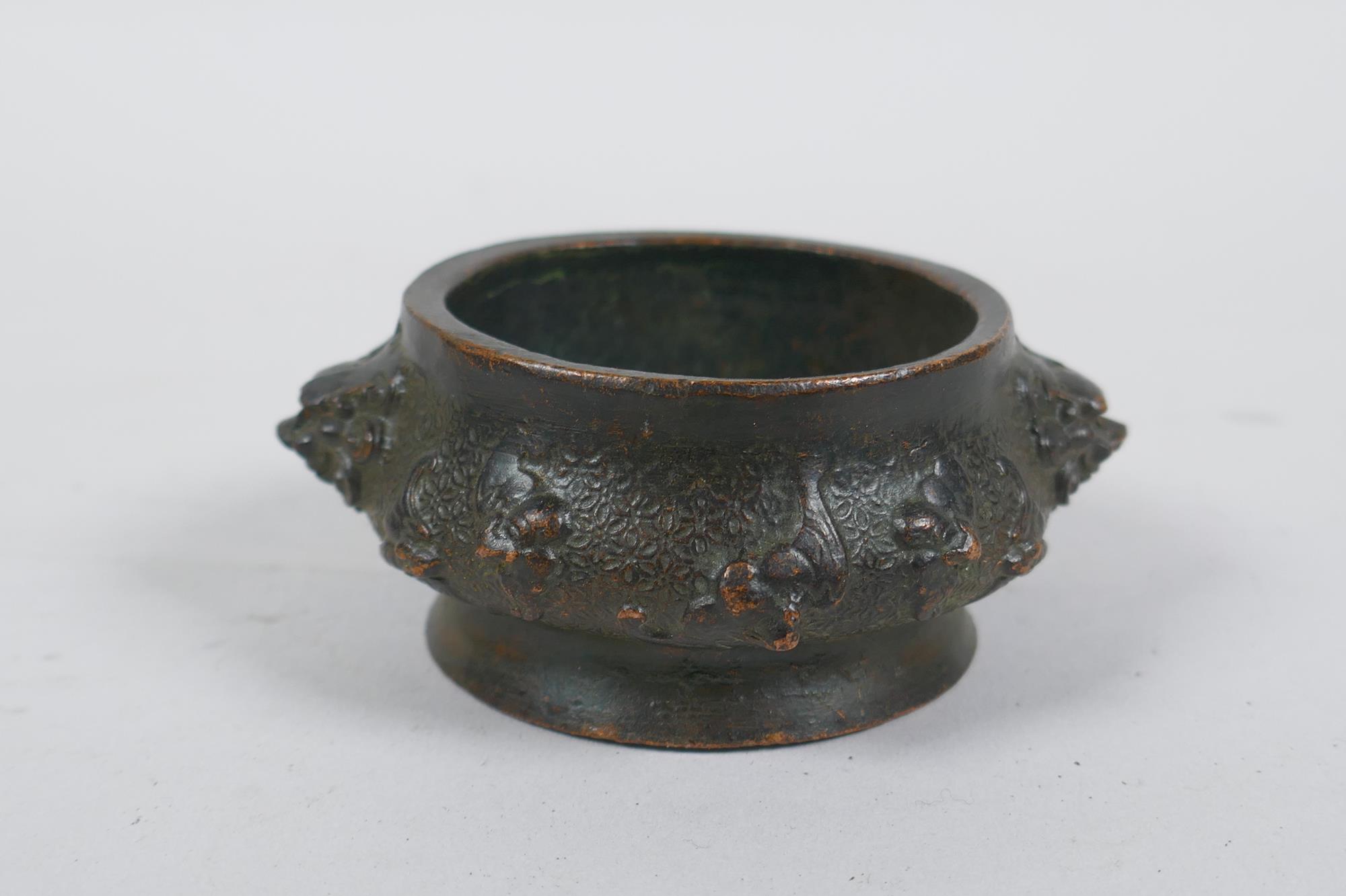 A miniature Chinese bronze censer with two elephant mask handles, and another with lion mask handles - Image 5 of 7