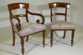 A set of eight (six plus two) Victorian mahogany bar back dining chairs raised on turned supports,