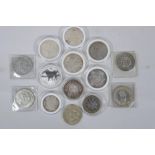 A quantity of Chinese facsimile (replica) white metal coinage, many coins in collector's cases