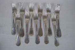 A matched set of eleven C18th French silver fiddle and thread pattern forks, 854g