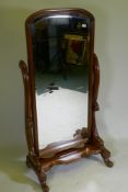 A Victorian style mahogany cheval mirror, with bevelled glass, 153cm high, 78cm wide