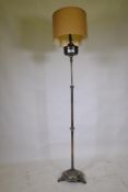 Antique silver plated telescopic floor oil lamp, converted to electricity, the back stamped EB.,