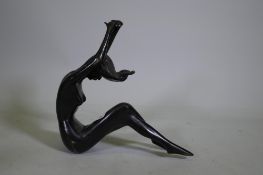 Bronze figure of a seated nude, unsigned, 40cm high