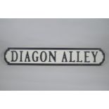 A painted wood Harry Potter 'Dragon Alley' road sign, 14 x 78cm long