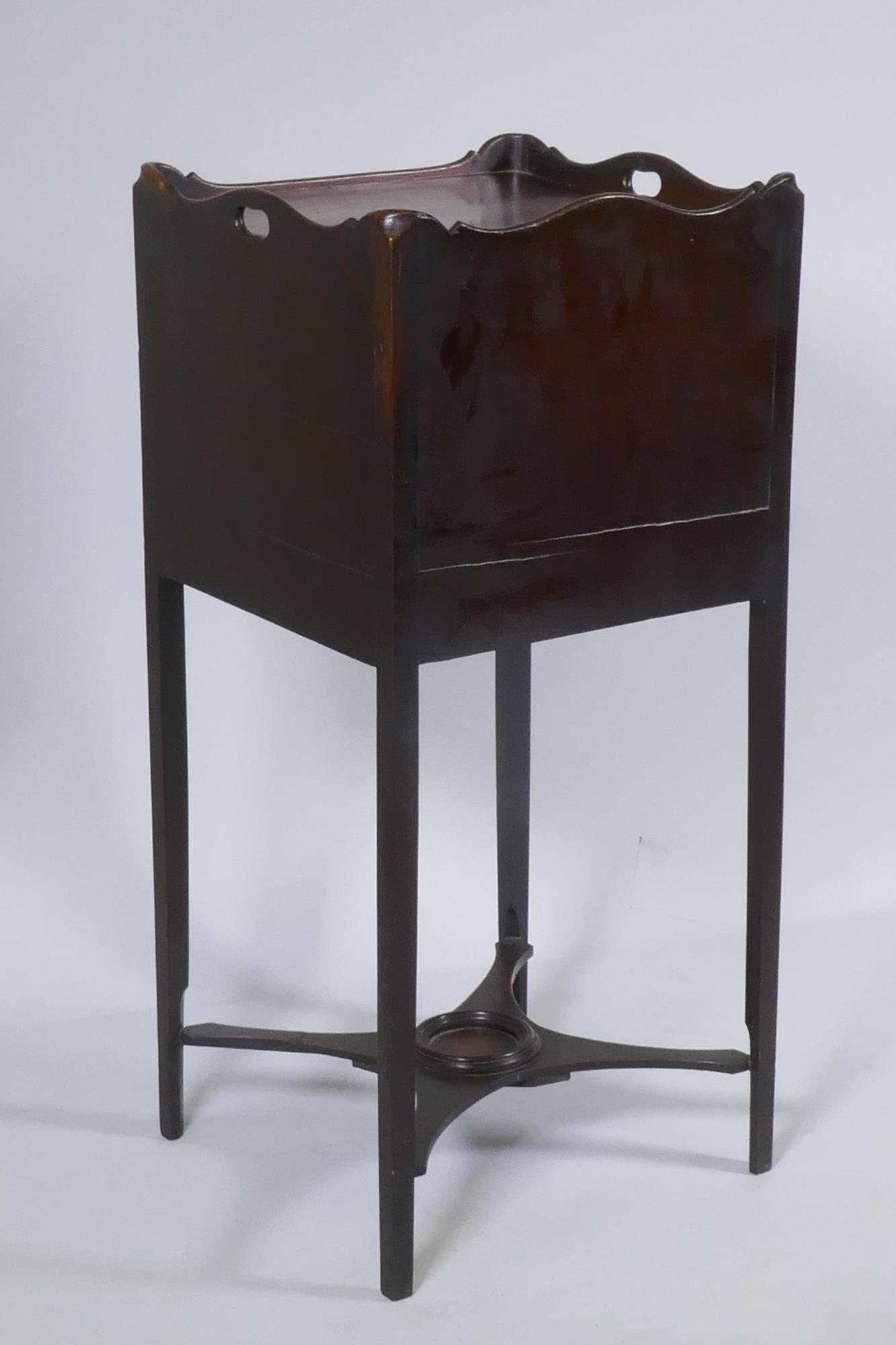 A George III mahogany pot cupboard with a shaped gallery top and single door over a cross stretchers - Image 4 of 4