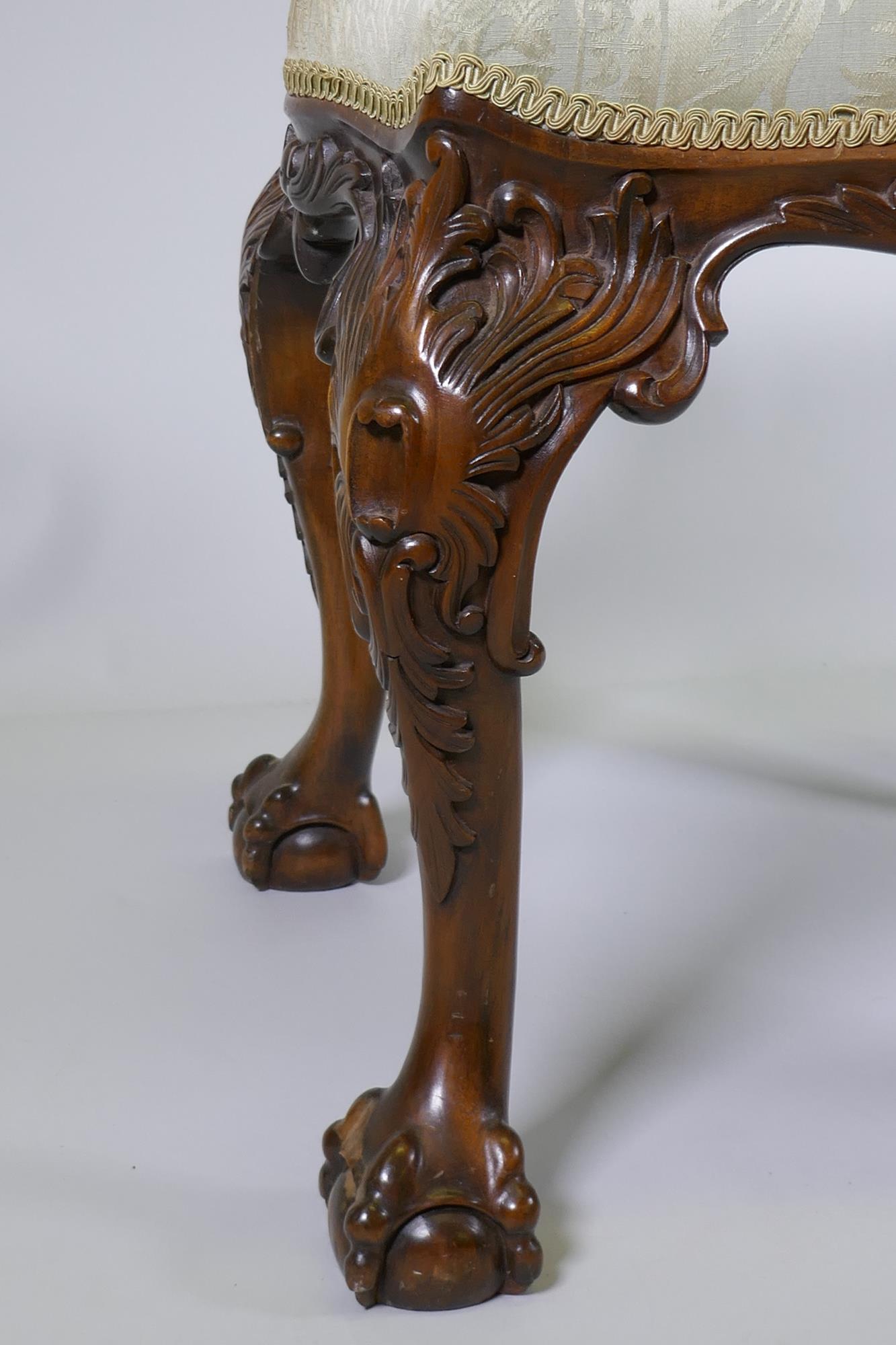 A Georgian style serpentine shaped walnut stool, with carved decoration, raised on cabriole - Image 3 of 4