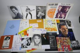 A quantity of music ephemera including signed pieces, photos, catalogues, music sheets etc,