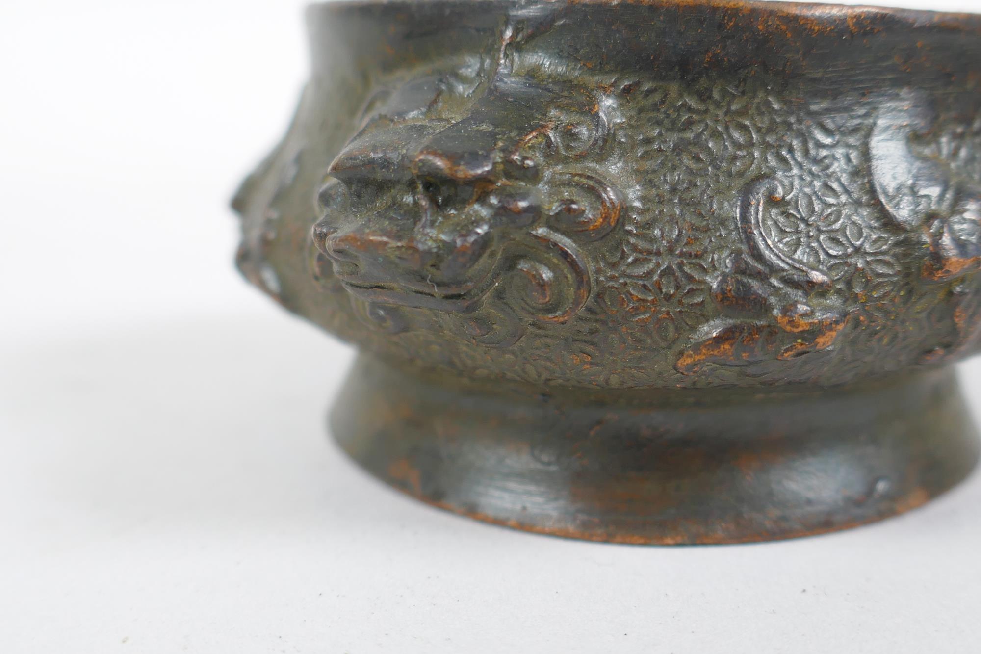 A miniature Chinese bronze censer with two elephant mask handles, and another with lion mask handles - Image 6 of 7