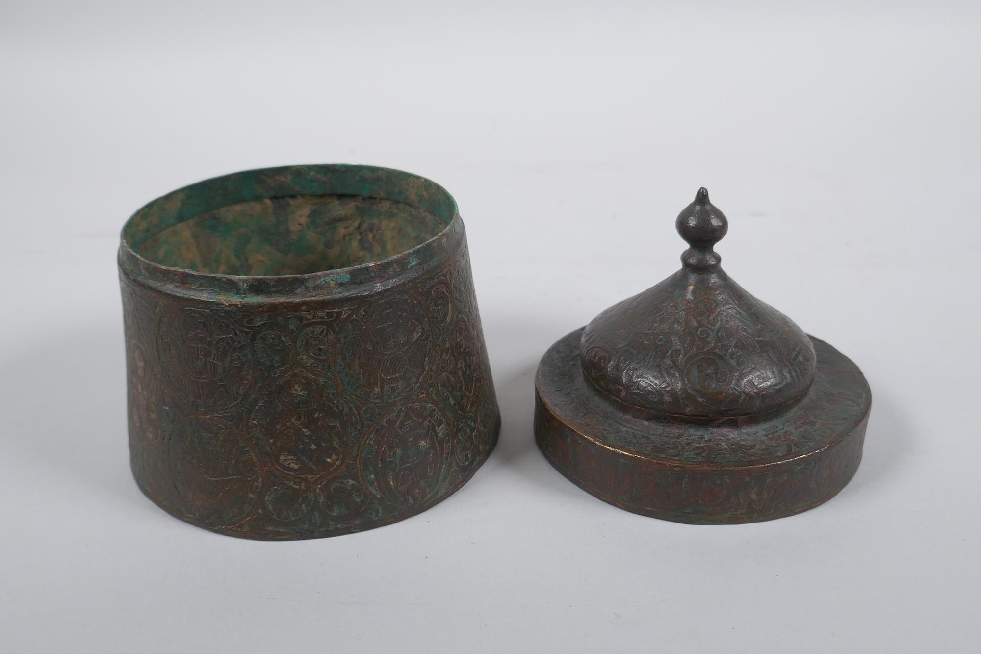 An antique Persian copper ink well with remnants of multi metal inlaid decoration, possibly - Image 6 of 6