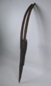 An African carved Chiwara (antelope) mask, probably from Mali, 77cm high