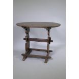 A C19th French oak trestle table, 66 x 90cm, 72cm high