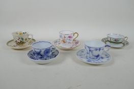Five porcelain cups and saucers in various patterns, including Meissen Onion Pattern, Royal
