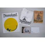 After Banksy, a Dismaland brochure, Dismaland T-shirt (child size M), and two FCK-PTN! postcards,