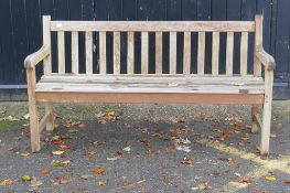 A teak garden bench, 153cm wide