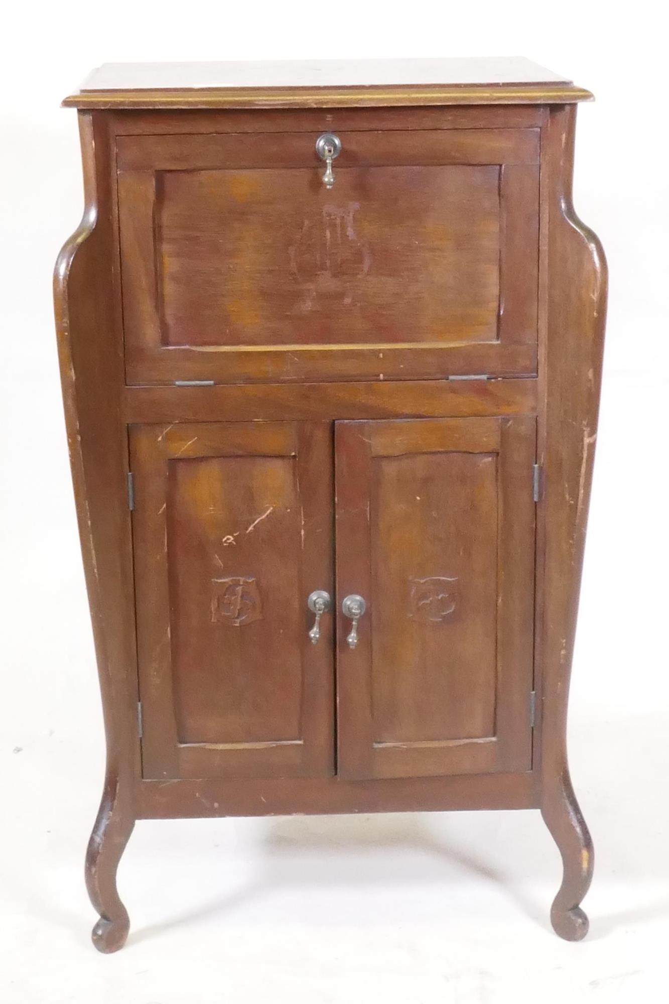An early C20th Art Nouveau style mahogany music cabinet, with fall front and two cupboards, 55 x - Image 2 of 3
