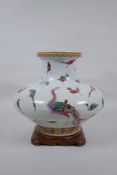 A Chinese late C19th polychrome porcelain squat form vase with allover enamelled bird decoration,