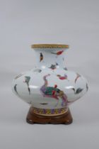 A Chinese late C19th polychrome porcelain squat form vase with allover enamelled bird decoration,