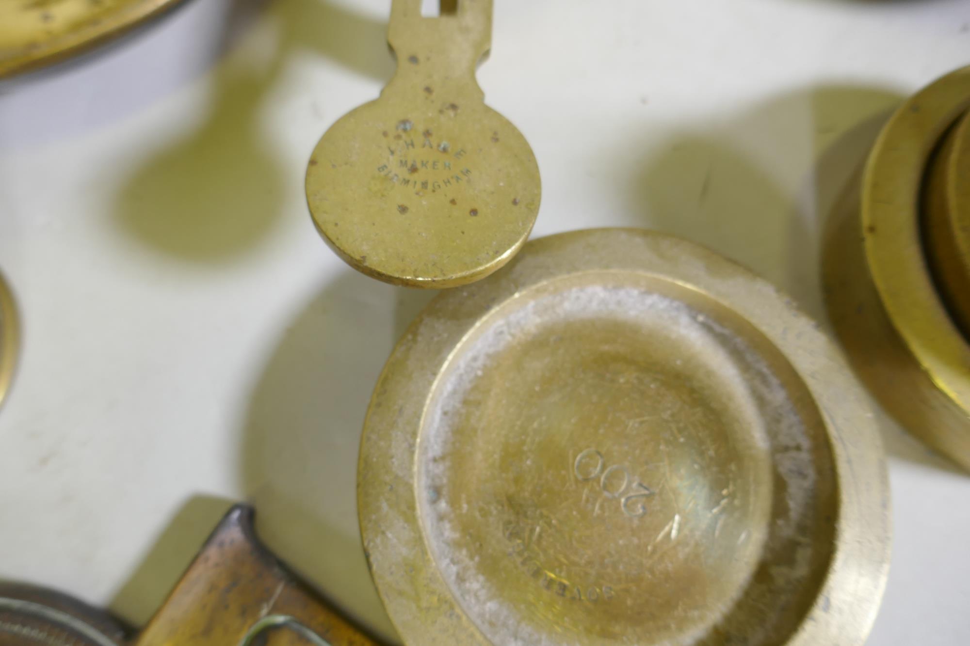 A set of brass balance scales stamped J. Hare, maker Birmingham, and weights, 56cm high, a pair of - Image 2 of 4