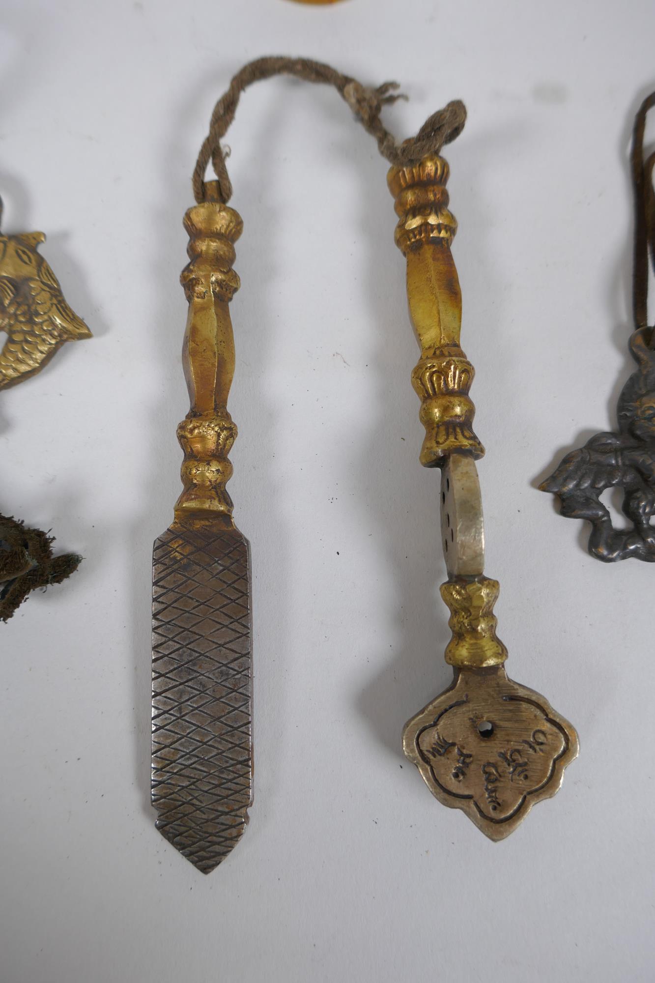 Two Tibetan brass medical instruments/tools, together with a Sino Tibetan bronze Buddha and two - Image 2 of 5