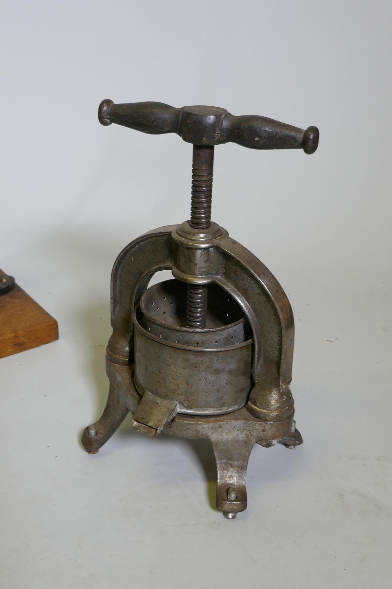 A quantity of vintage kitchenalia, to include a cast metal French fruit/cheese press, a cast iron - Image 2 of 7