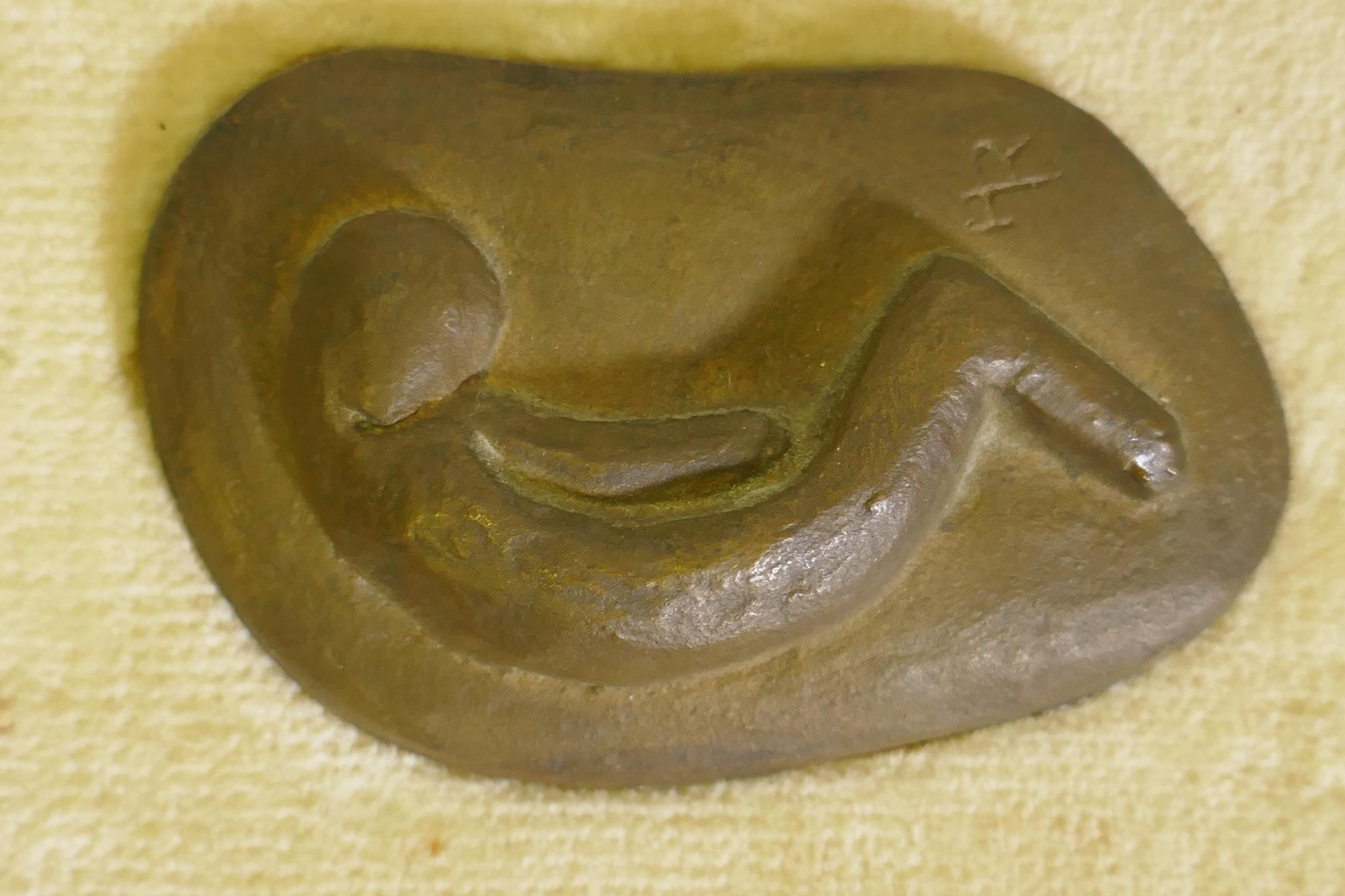 A small bronze depicting a curled figure, signed with a monogram HR, 9cm long - Image 2 of 2