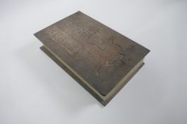 A Chinese wood and silk bound book containing white jade tablet pages with chased and gilt