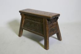 A C19th Chinese elm barber's stool with two end drawers, 42 x 23cm, 28cm high