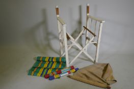 A vintage campaign chair with cotton canvas covers to complete