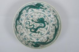 A porcelain dish with green enamel dragon decoration, Chinese YongZheng 6 character mark to base,