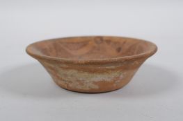 A Moorish terracotta bowl, 9.5cm diameter