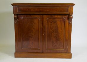 A C19th mahogany chiffonier, with single frieze drawer over two cupboards, raised on a plinth