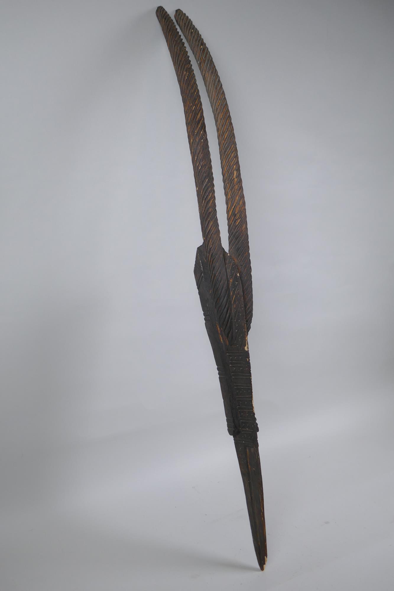 An African carved Chiwara (antelope) mask, probably from Mali, 77cm high - Image 3 of 3