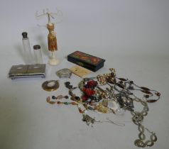 A small quantity of vintage costume jewellery, agate necklaces etc, a framed cameo, ring tree, two