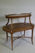 A Victorian two tier rosewood etagere with inlaid decoration, the lift off tray top with glass base,