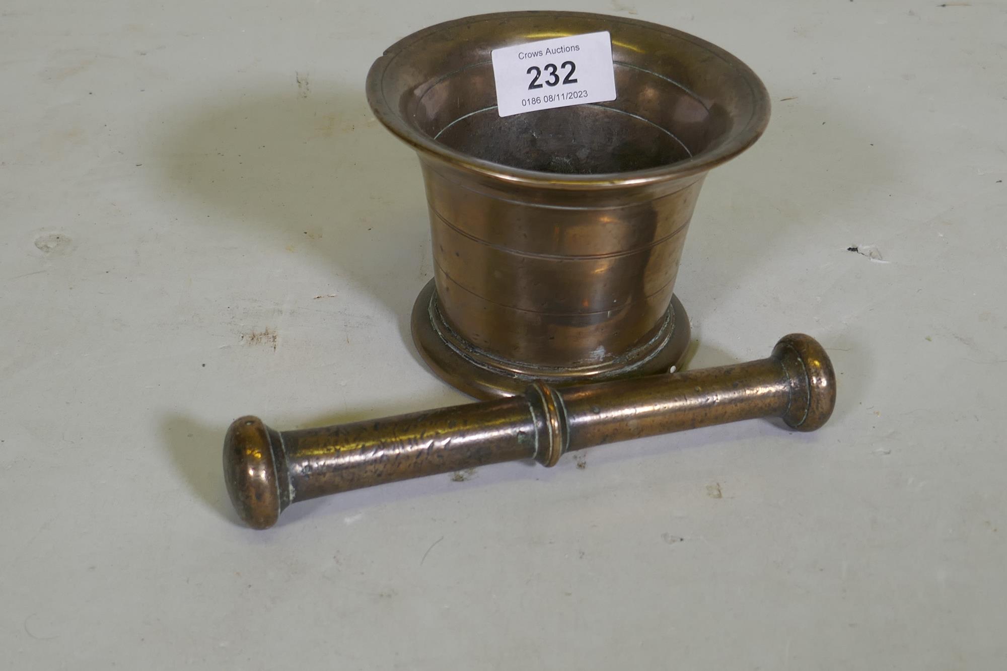An C18th bronze mortar and pestle, 9cm high - Image 2 of 2