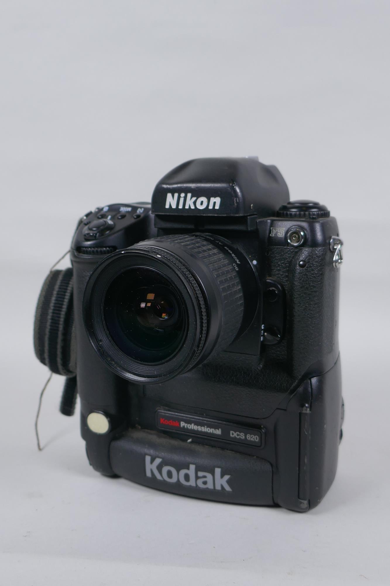 A Nikon F5 Kodak Professional DCS 620 digital camera, fitted with an AF Nikkor 28-80mm lens,