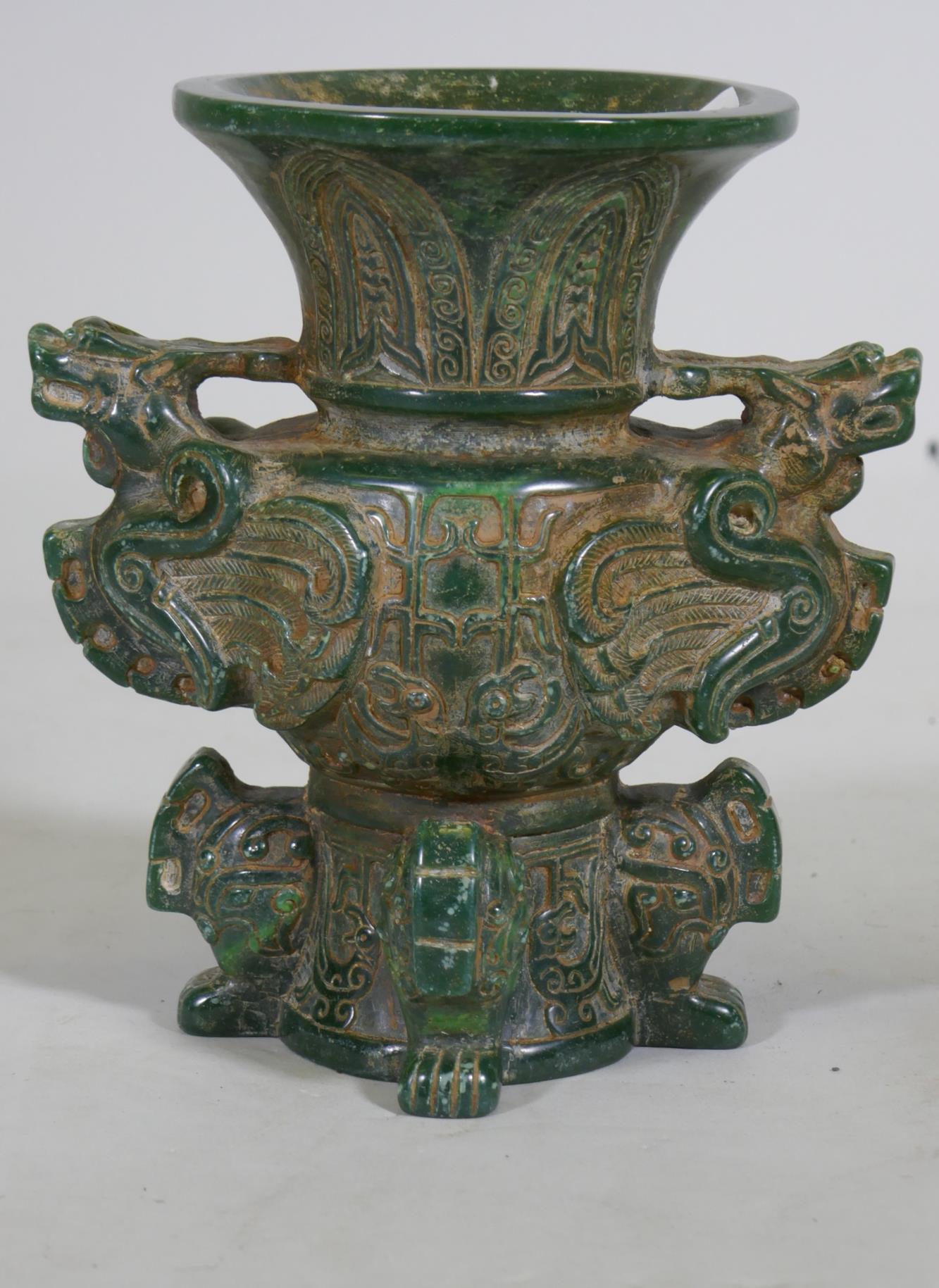 A Chinese green hardstone vase with dragon decoration, 19cm high