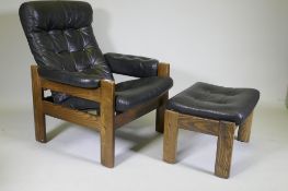 A mid century Ekornes leather reclining chair with ash frame and matching footstool