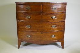 A George II mahogany bow front chest of two over three drawers, with brass plate handles, raised