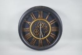 A vintage style wall clock with quartz movement and separately powered open cog work, with bronzed