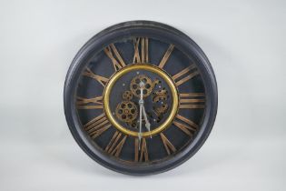 A vintage style wall clock with quartz movement and separately powered open cog work, with bronzed