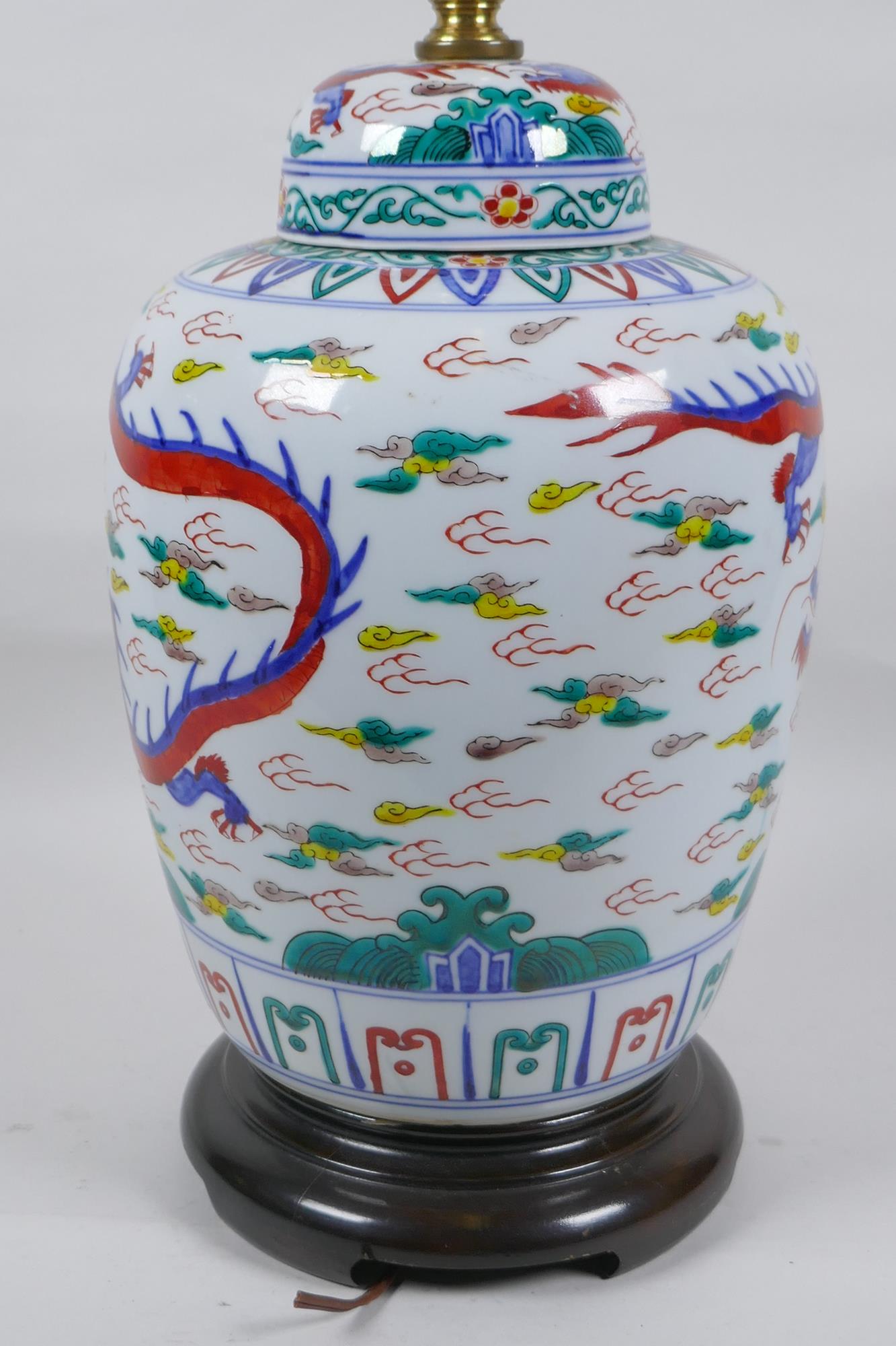 A Chinese Wucai porcelain jar and cover with dragon decoration, converted to a lamp, 41cm high - Image 5 of 5