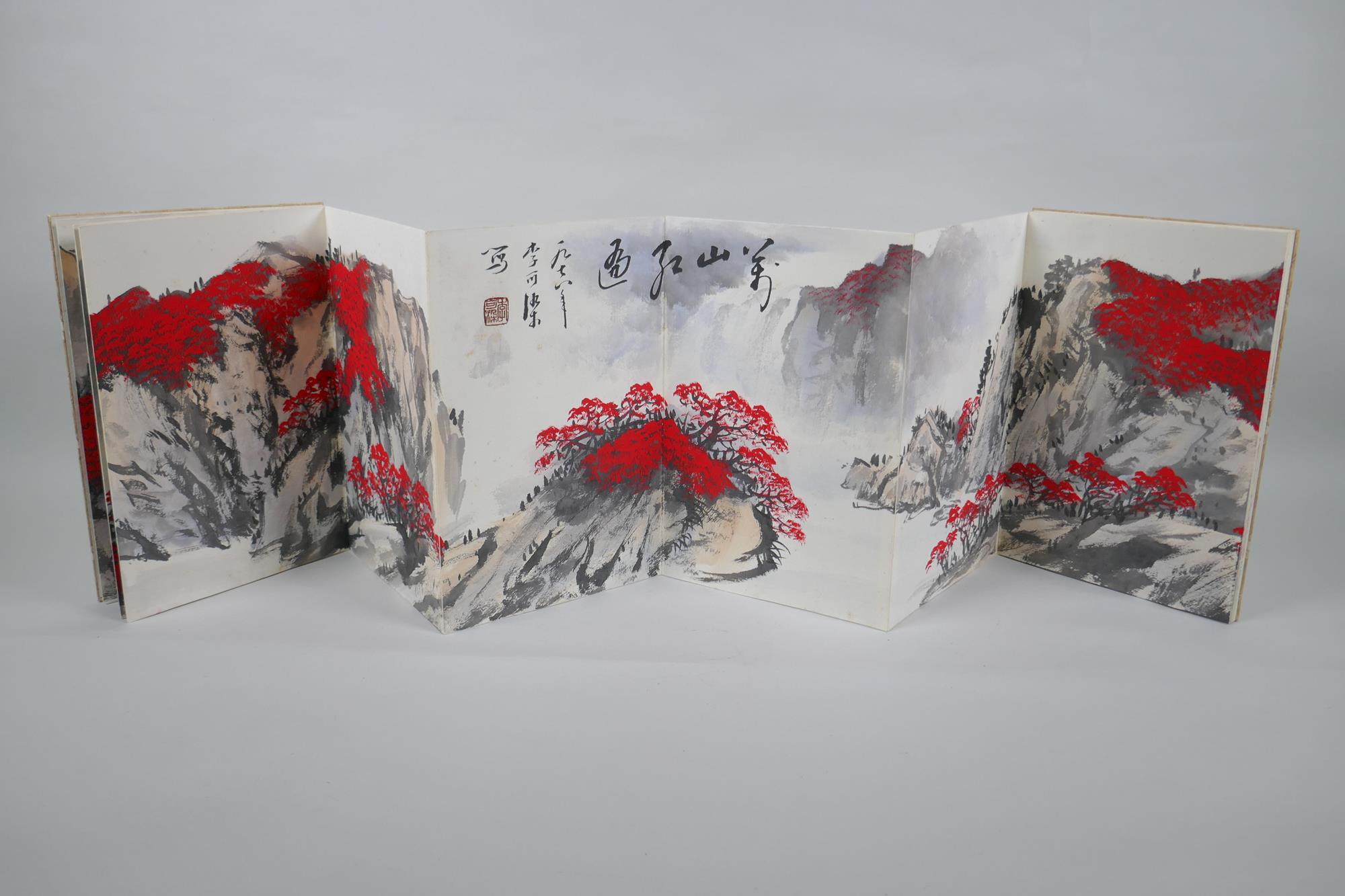 A Chinese watercolour concertina book depicting a mountain river scene, 17 x 25cm